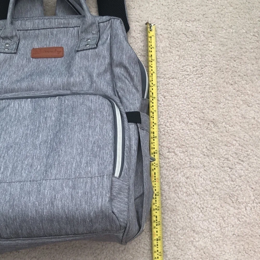 Baby changing gray backpack with multiple pockets